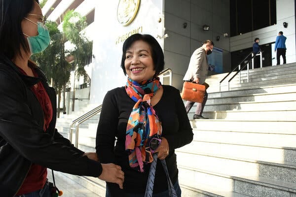 The former Thai civil servant identified as Anchan P. arrived at court in Bangkok on Tuesday before her sentencing on l&egrave;se-majest&eacute; charges.
