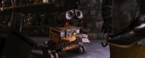 Pixar's robot protagonist WALL-E, anthropomorphic as ever, gazes down slowly and glumly at his interlaced metal fingers.