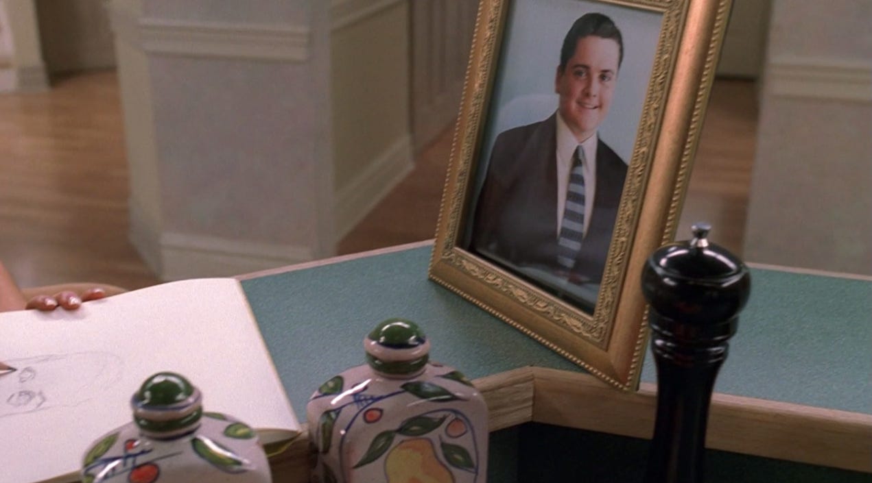 A framed photo of A.J. Soprano