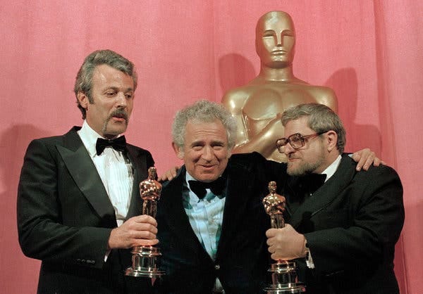 Norman Mailer, center, presented the writing Oscars to Mr. Goldman, left, for &ldquo;All the President&rsquo;s Men&rdquo; (best adapted screenplay) and Paddy Chayefsky for &ldquo;Network&rdquo; (best original screenplay) at the 1977 Academy Awards.