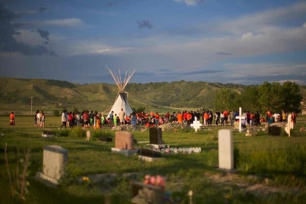 A vigil on Saturday at the site of the former Marieval Indian Residential School, where more than 750 unmarked graves were found, on the Cowessess First Nation in Saskatchewan.