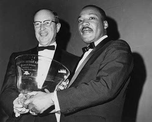 Martin Luther King, Jr. receiving an award from Rabbi Jacob Rothschild in recognition of his 1964 Nobel Peace Price at a dinner in his honor at the Dinkler Plaza Hotel on 27 January 1965. [Photograph courtesy of the Atlanta History Center.]