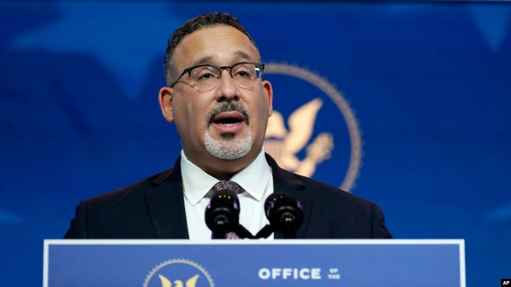 Miguel Cardona, President-elect Joe Biden's nominee for Secretary of Education, speaks after being introduced at The Queen Theater in Wilmington, Del., Wednesday, Dec. 23, 2020. (AP Photo/Carolyn Kaster)