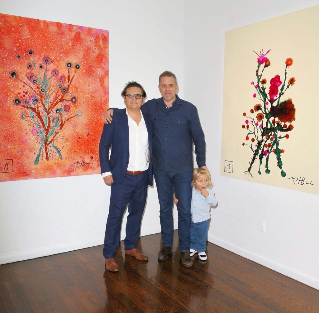 Hunter Biden and his young son, Beau, with his gallerist Georges Berges.