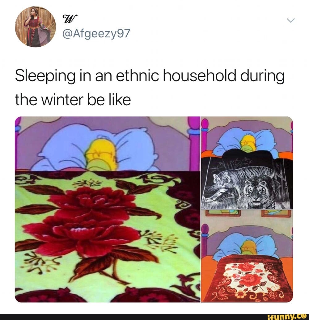 Three images of Homer Simpson sleeping under various ornately patterned blankets. Two blankets have floral patterns and one has an image of a tiger. The text reads, "Sleeping in an ethic household during the winter be like"