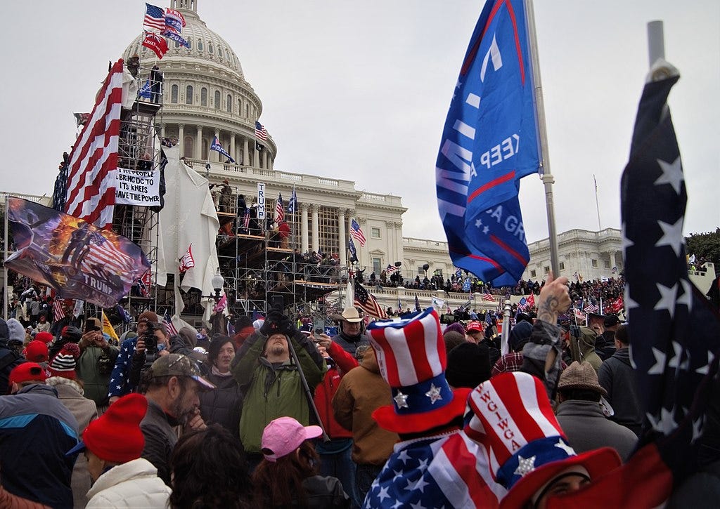 Donald Trump's supporters storm the US Capitol building on January 6, 2021 (Image: Tyler Merbler from USA, CC BY 2.0, via Wikimedia Commons)