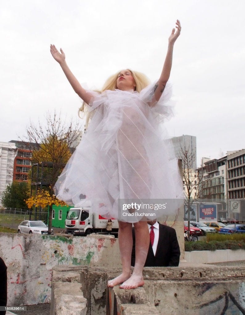 Lady Gaga is sighted standing on a section of the Berlin Wall at the...  News Photo - Getty Images