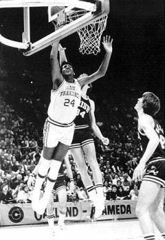 COVER BOY: Bill Cartwright stood tall for the Dons on the court during their glory days thirty years ago. (Courtesy of USF)