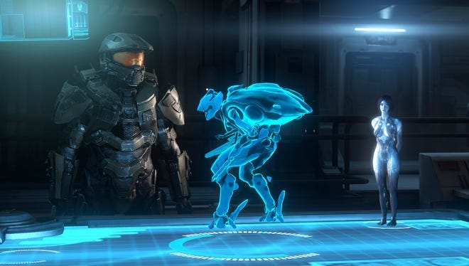 In 'Halo 4,' out Nov. 6 for Xbox 360, the Master Chief awakes to face a new interstellar threat.  Here, he and artificial intelligence assistant Cortana evaluate a hologram of a Promethean, their new enemy.  