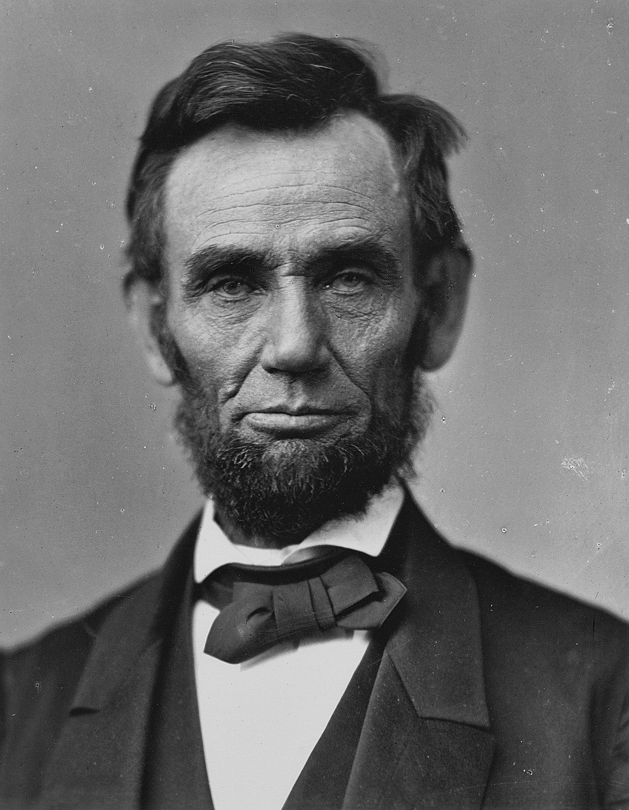 A bearded Abraham Lincoln showing his head and shoulders
