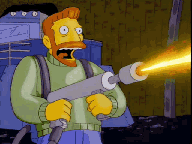 Animated gif of Hank Scorpio torching things with a flamethrower, laughing maniacally.