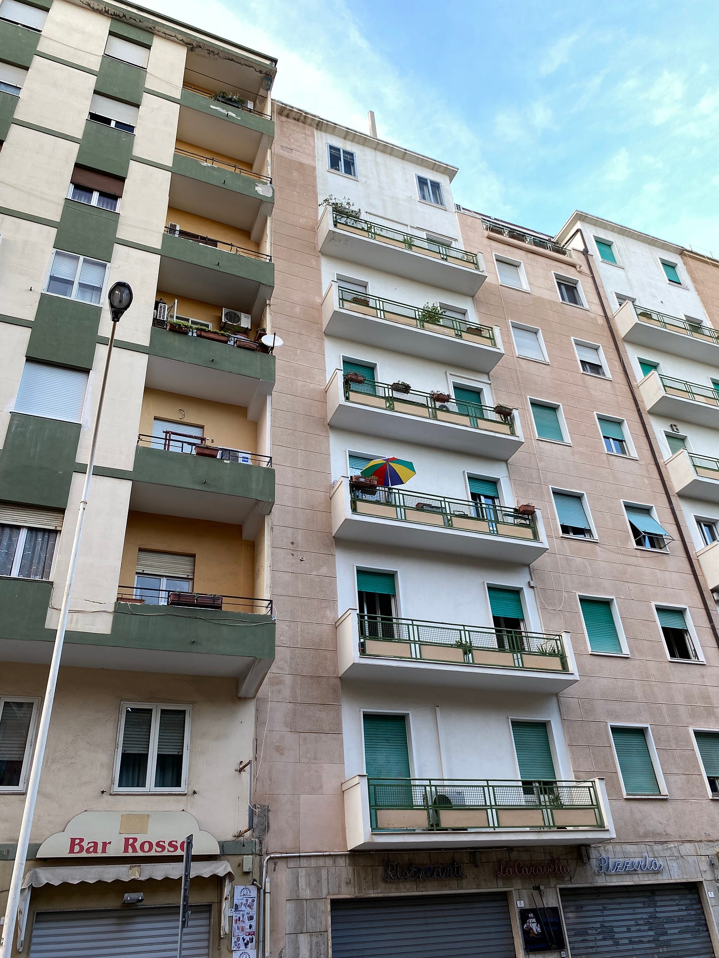 Sardinia balconies are full of colourful umbrellas 