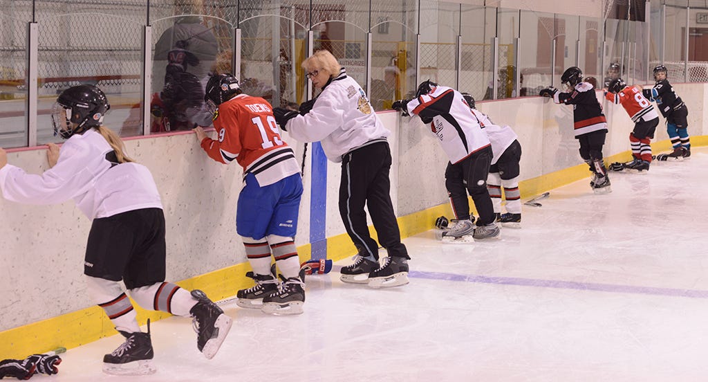 Slideshow: Laura Stamm works with youth hockey players