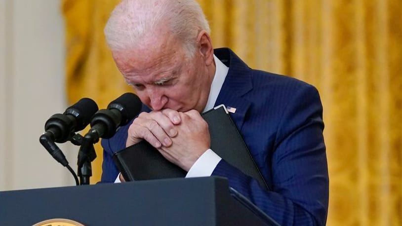 President Joe Biden pauses as he listens to a question about the bombings at the Kabul airport that killed at least 12 U.S. service members, from the East Room of the White House, Thursday, Aug. 26, 2021, in Washington. (AP Photo/Evan Vucci)
