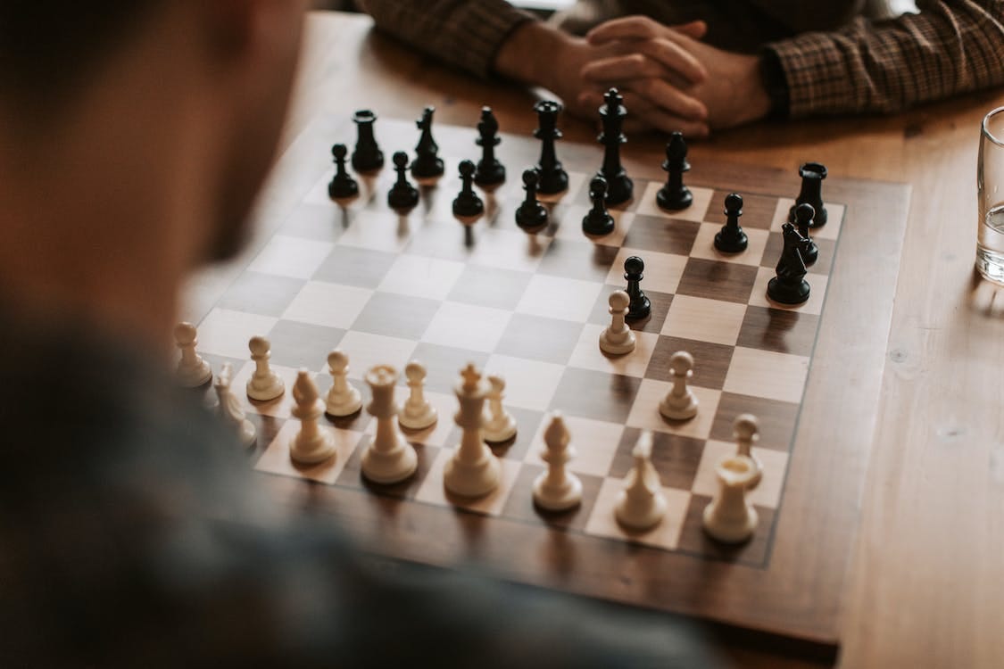 Free Men Playing Chess Stock Photo