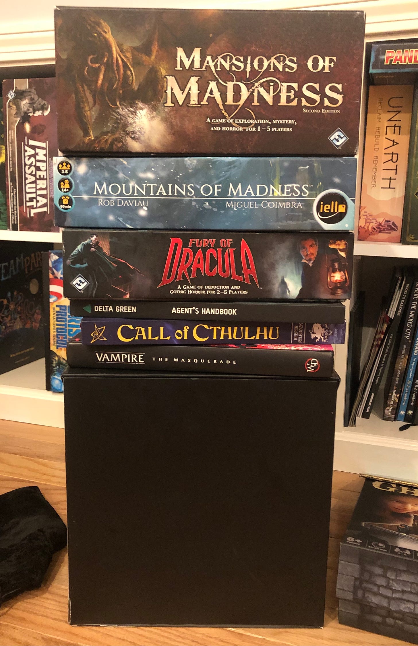 Mansions and Mountains of Madness, Fury of Dracula, Delta Green, Call of Cthulhu, Vampire: The Masquerade, Invisible Sun