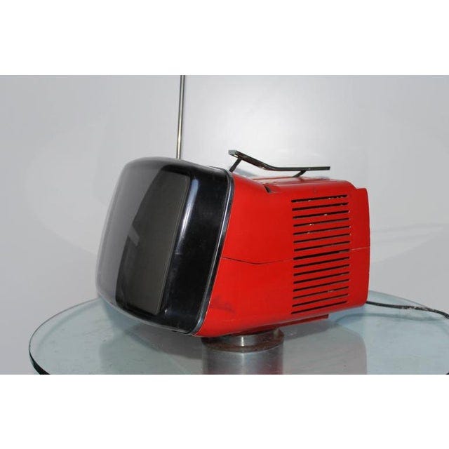 Red Algol 11 portable television by Marco Zanuso and Richard Sapper for Brionvega. A classic of Italian design. It needs...