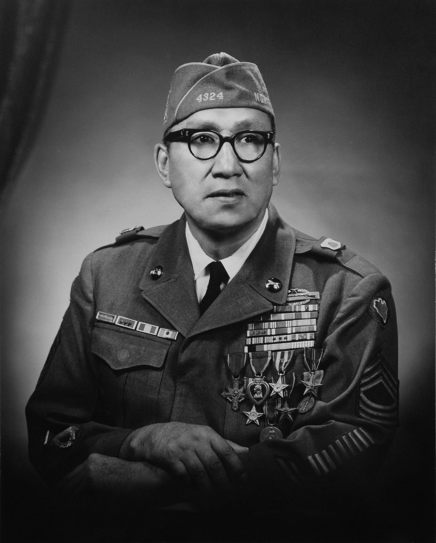 Black and white photo of Woody Keeble, in uniform. 
