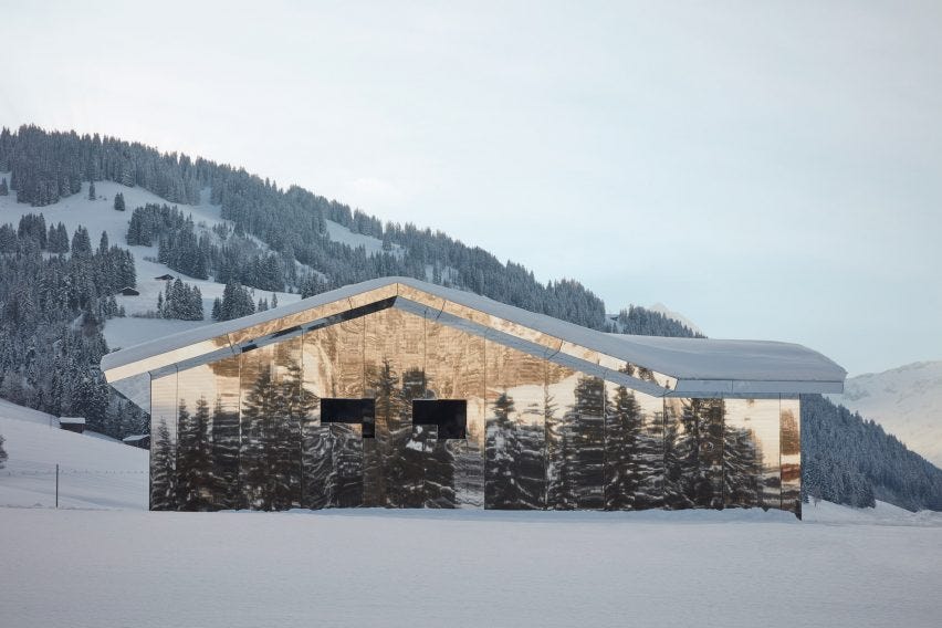 Mirage Gstaad mirrored building art installation by Doug Aitken in Switzerland in winter