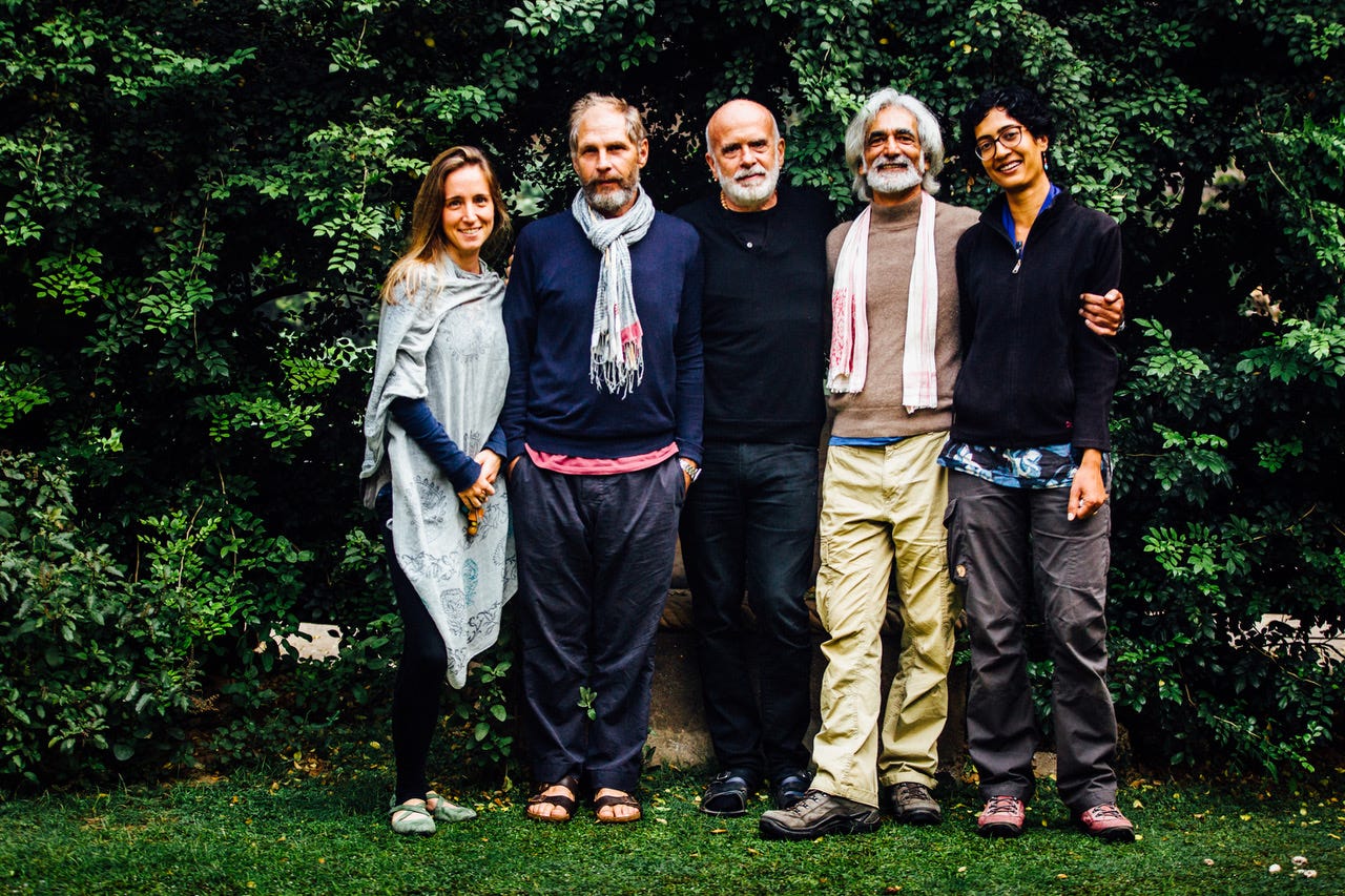 image of the author and four other visitors to the Lutyens Bungalow in front of lush greenery