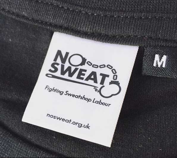The inside label of a t-shirt with the No Sweat logo on it