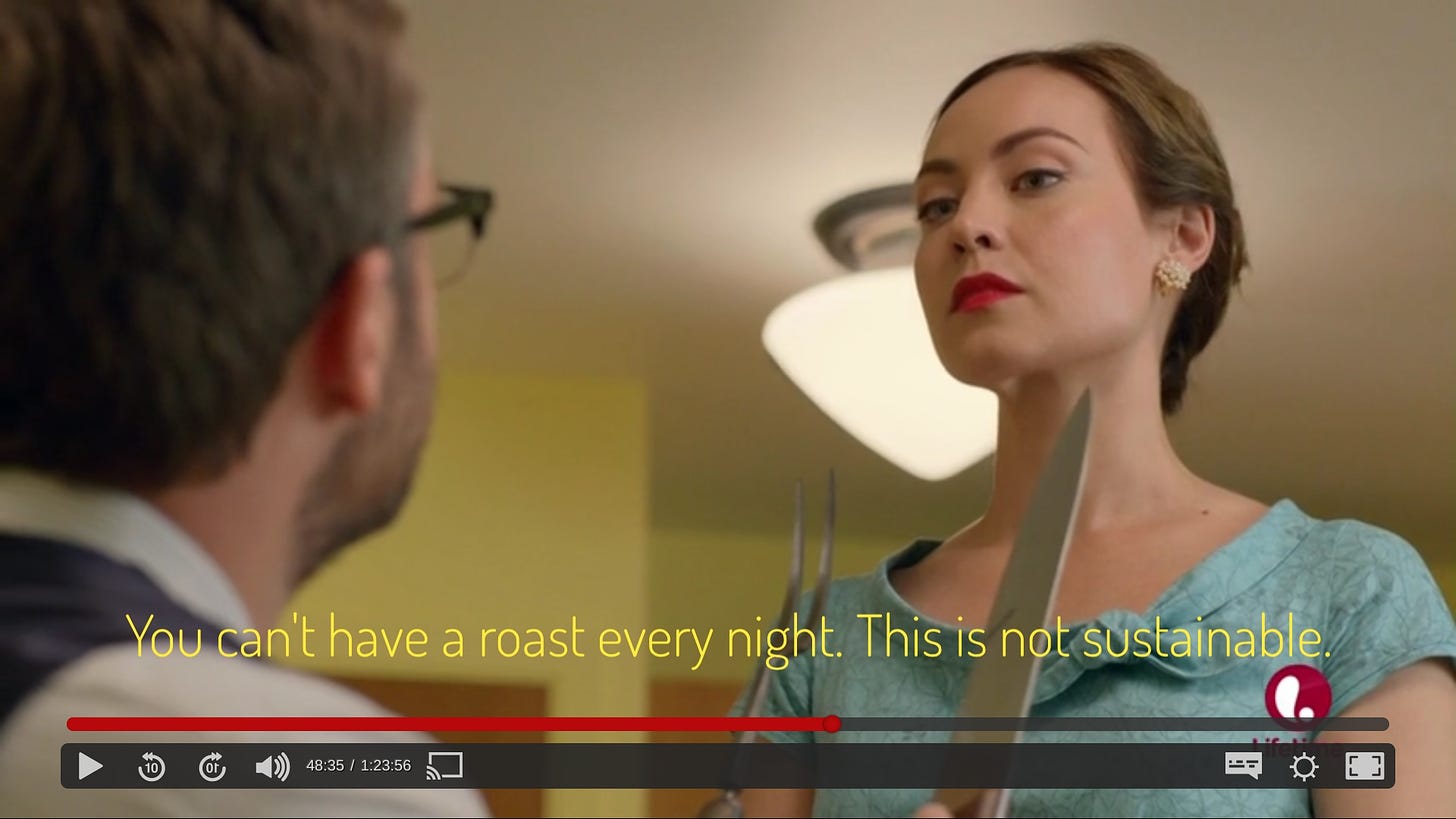 Simon offering a skeptical Jess the carving knife and fork, captioned "You can't have a roast every night. This is not sustainable."