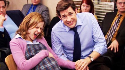 Pam crushing Jim's hand during a contraction.