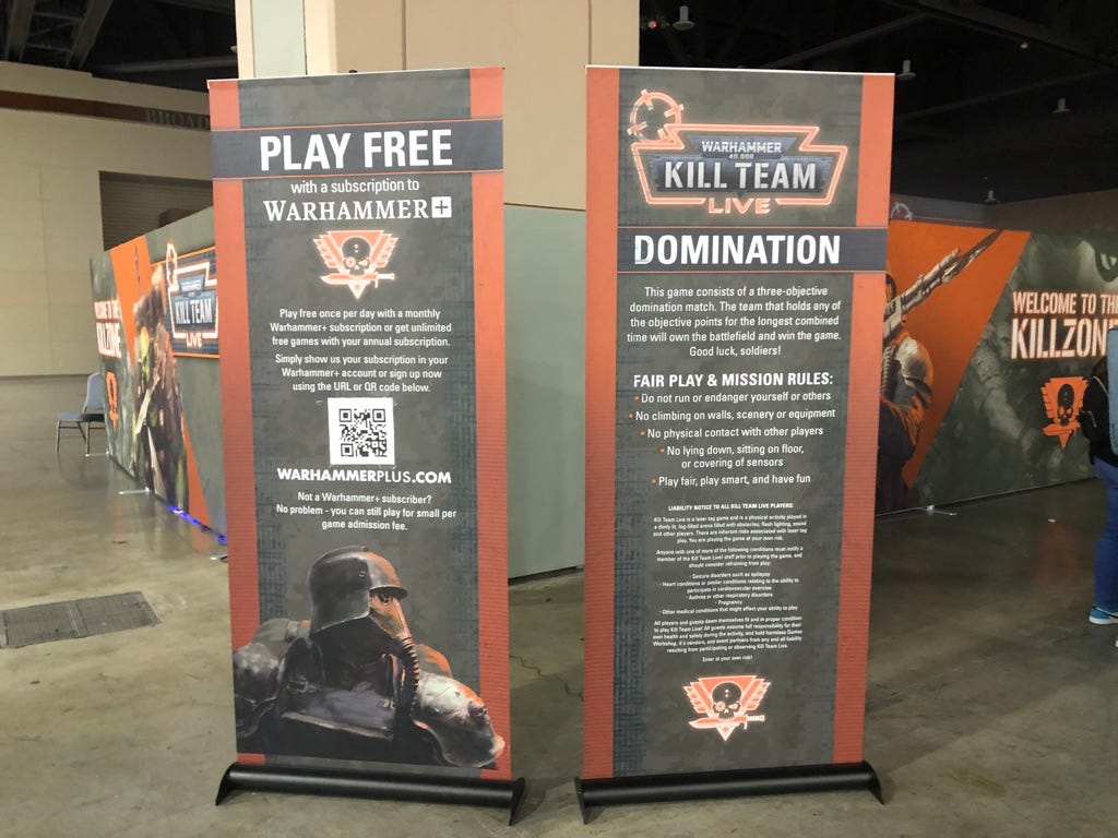 Informational banners describing the content and rules of the Kill Team Live laser tag event.