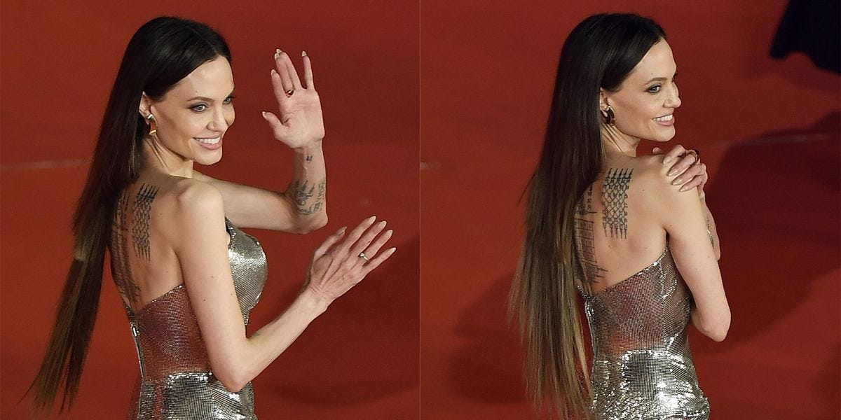 Angelina Jolie Had a Red Carpet Hair Malfunction in Rome - PAPER