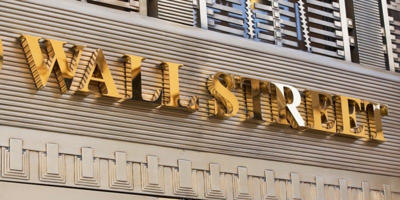 A golden Wall Street sign