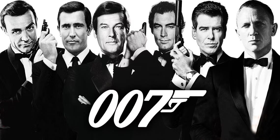 This black-and-white image shows the six actors who've played James Bond in EON Productions' cinematic adaptations of Ian Fleming's novels since 1962. Each man's portrait as Bond overlaps the next, while EON's official "007" logo, centered in the frame, appears below their faces. From left to right are: Sir Sean Connery, George Lazenby, Sir Roger Moore, Timothy Dalton, Pierce Brosnan, and Daniel Craig. This black-and-white image shows the six actors who've played James Bond in EON Productions' cinematic adaptations of Ian Fleming's novels since 1962. Each man's portrait as Bond overlaps the next, while EON's official "007" logo, centered in the frame, appears below their faces. From left to right are: Sir Sean Connery, George Lazenby, Sir Roger Moore, Timothy Dalton, Pierce Brosnan, and Daniel Craig.