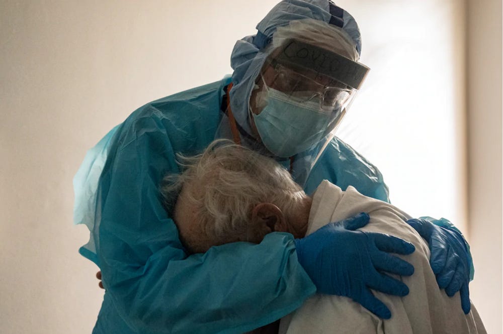 Dr. Joseph Varon who’s worked 256 days straight during pandemic, comforts lonely elderly Covid 19 patient in Houston