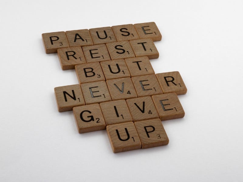 pause, rest, but never give up scrabble pieces