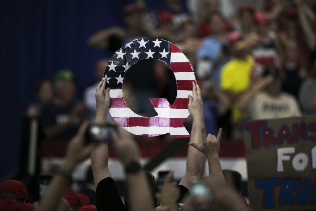 Facebook says it will ban groups that 'represent' QAnon | PBS NewsHour