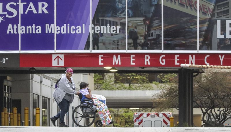 The Emergency Room Entrance at Wellstar Atlanta Medical Center on Boulevard in Atlanta. Hospitals are stocking up on gowns and protective wear and holding refresher courses in infection control amid a growing coronavirus outbreak. JOHN SPINK/JSPINK@AJC.COM