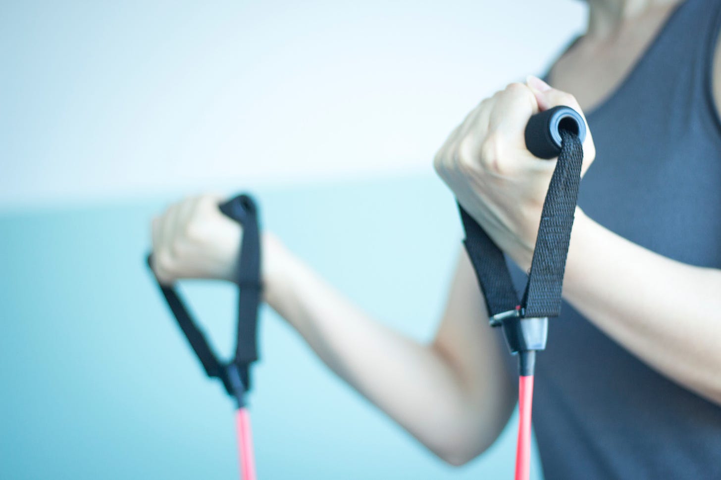 Woman Exercising Exercise Bands