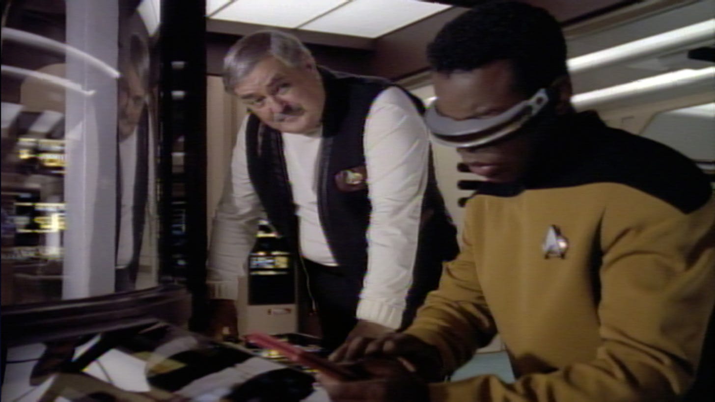 ST:TNG screen cap of Scotty and LaForge in Engineering.