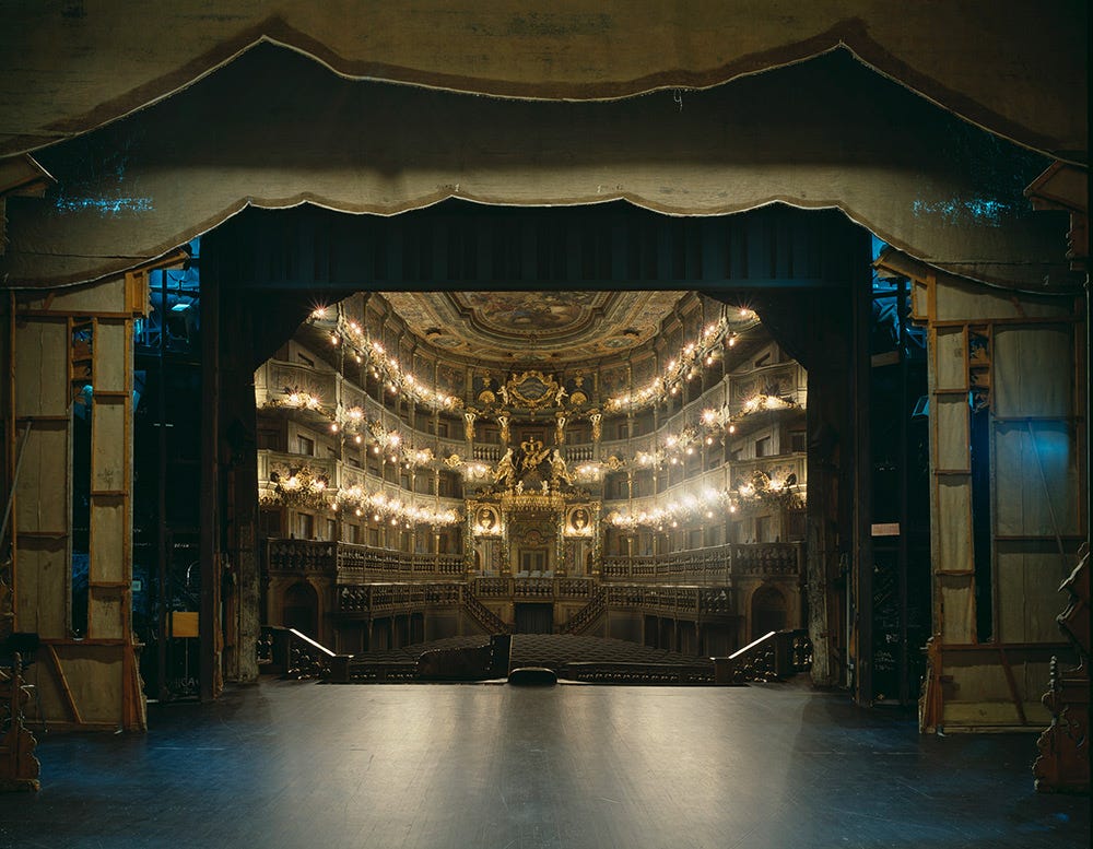 the view of an ornate stage from behind, with all the metal fascia in full view