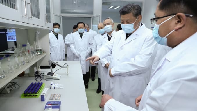 Chinese President Xi Jinping learns about the progress on scientific research on a coronavirus vaccine and antibody during his visit to the Academy of Military Medical Sciences in Beijing, capital of China, March 2, 2020.