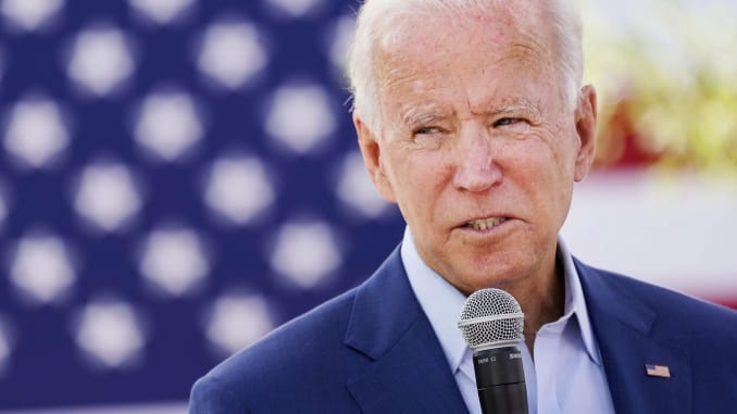 Democratic U.S. presidential nominee Joe Biden speaks to attendees at an outdoor "Black Economic Summit" while campaigning for president in Charlotte, North Carolina, September 23, 2020.