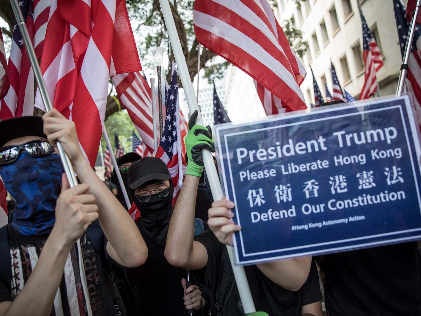 Hong Kong protesters, waving American flags, call on Trump to 'liberate ...