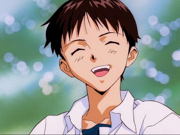 Shinji smiling and facing the viewer.