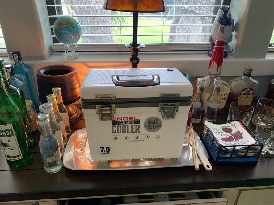 A picture containing text, indoor, table, cluttered

Description automatically generated