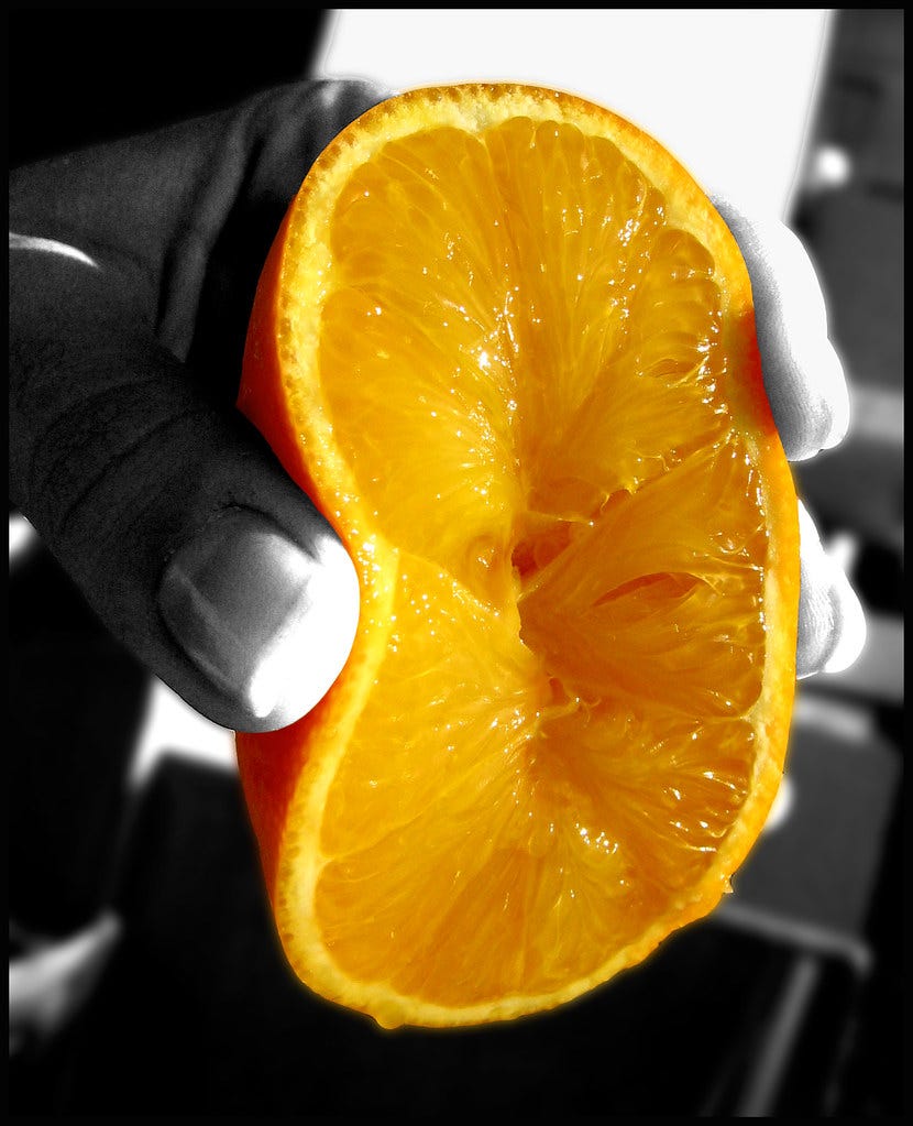 Squeezing orange
