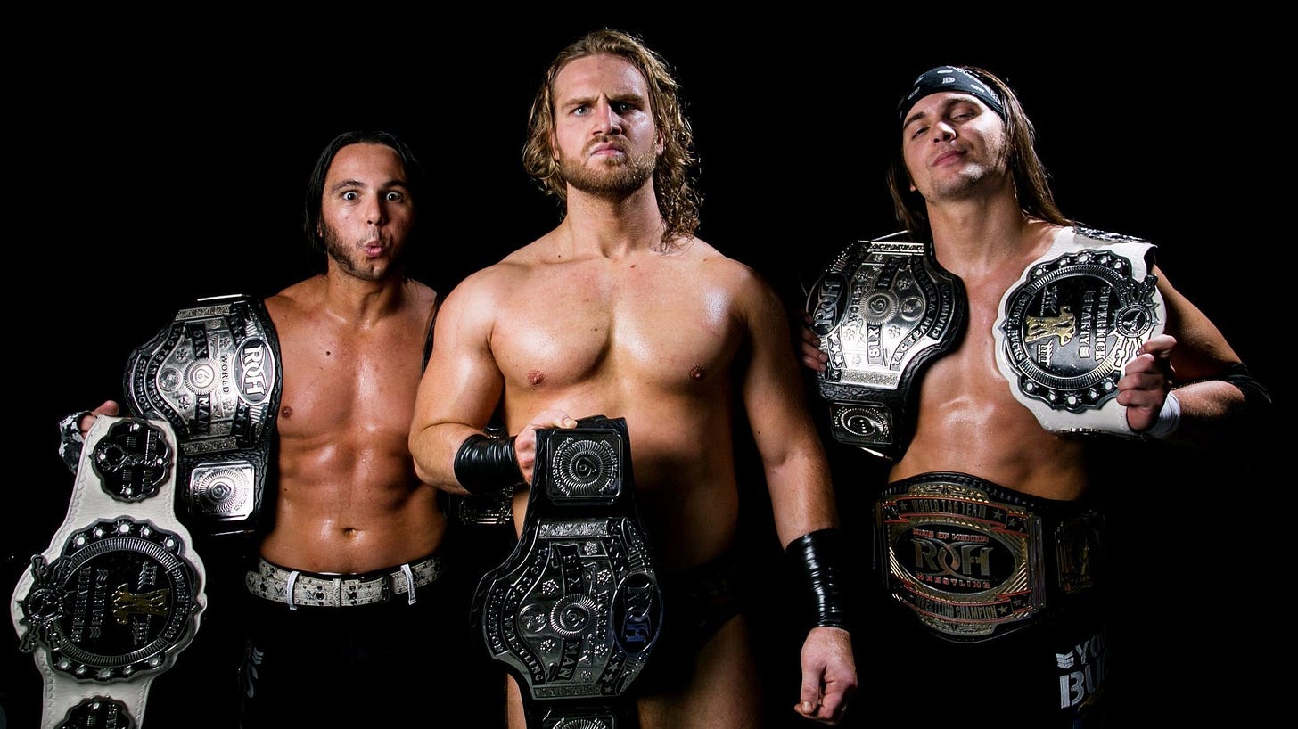 Matt Jackson, Hangman Page, and Nick Jackson holding the ROH six man tag titles