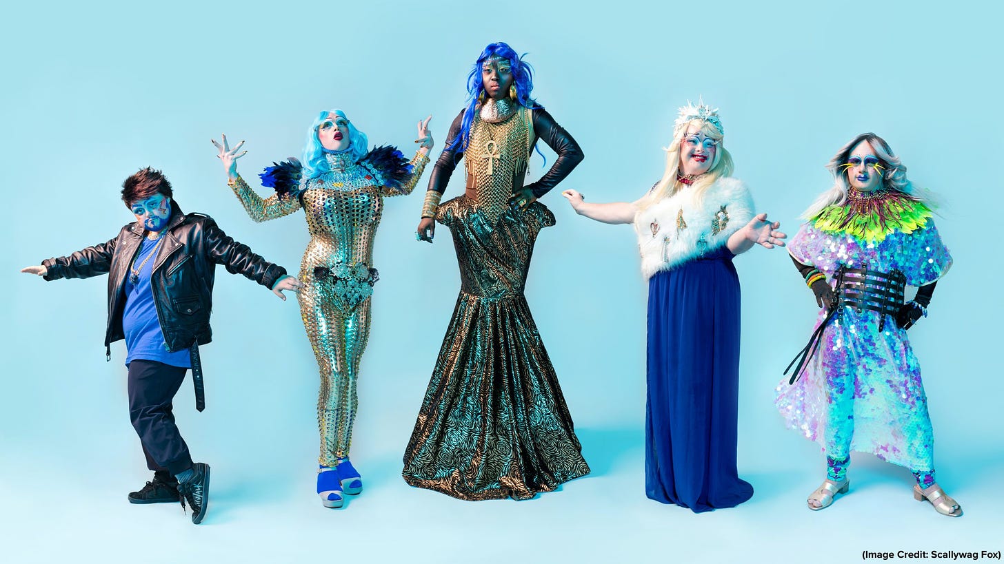 5 artists with Down Syndrome are posing in head-to-toe drag extravaganza. They have royal, stately poses and complex, high-shine fabrics.