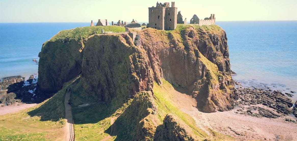 Photograph of Dunnottar Castle, a ruined castle on an imposing rocky promontory jutting out into the North Sea south of Stonehaven.