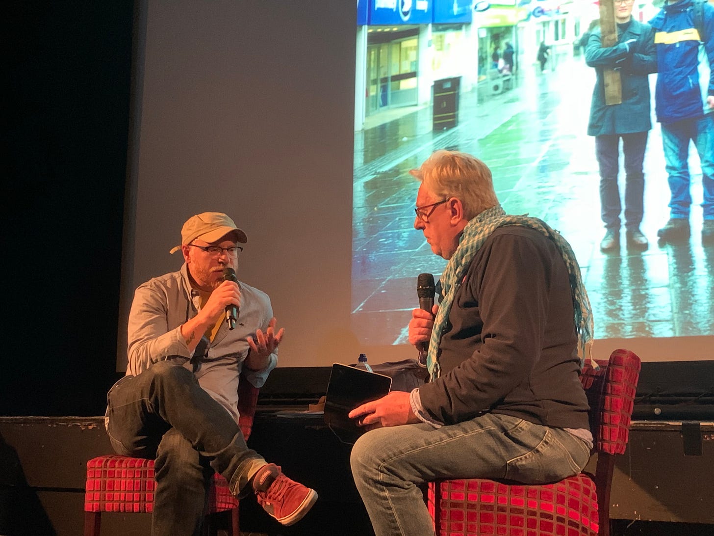 Dan Wood talking with fellow photographer and Ffoton co-founder Emyr Young at the Northern EYE Festival 2019