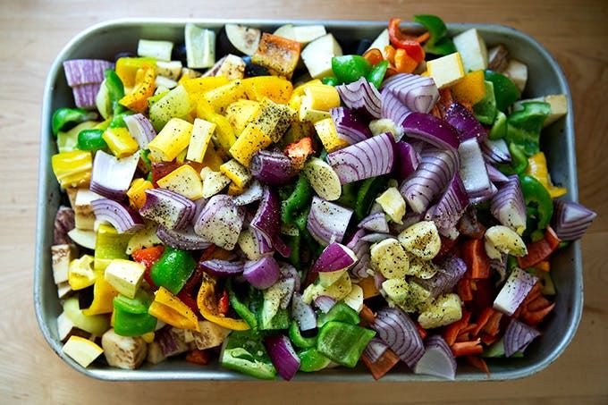 A pan of vegetables on a kitchen counter. 
