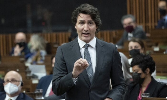 Prime Minister Justin Trudeau rises during question period in the House of Commons in Ottawa on Feb. 15, 2022. (The Canadian Press/Adrian Wyld)